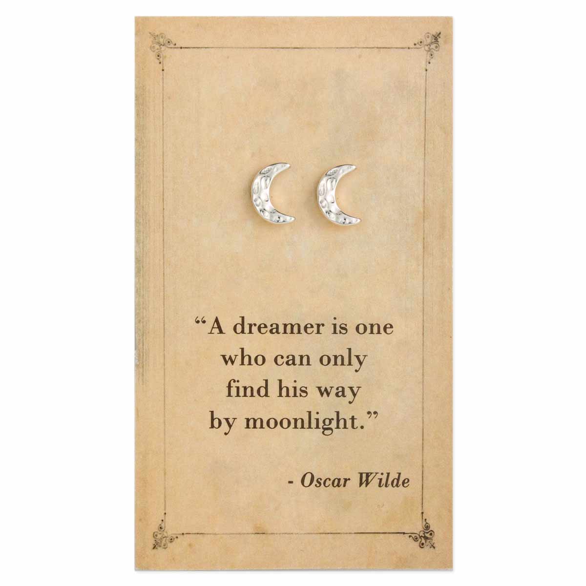 Moon-shaped earrings on a decorative card with an Oscar Wilde quote.