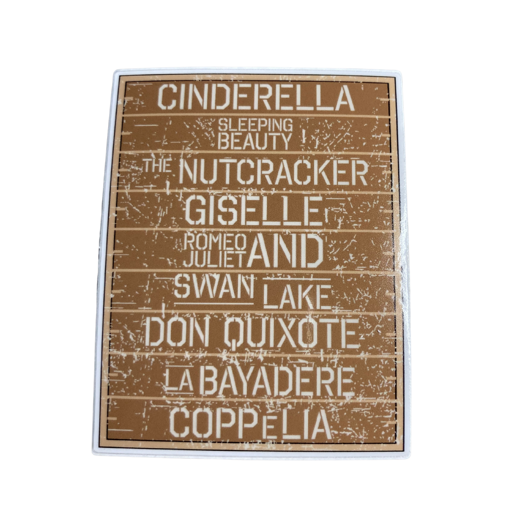 Decorative sign with classical ballet titles on a brown background