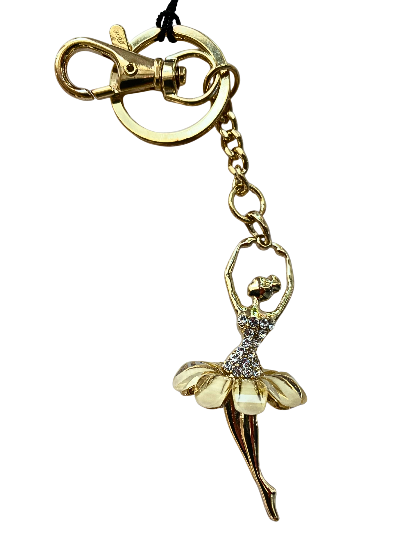 Gold keychain with a ballerina charm on a white background