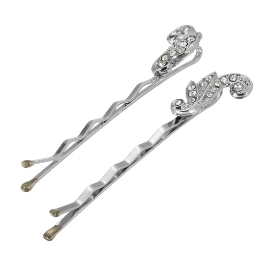 Two silver hair pins with decorative elements on a white background