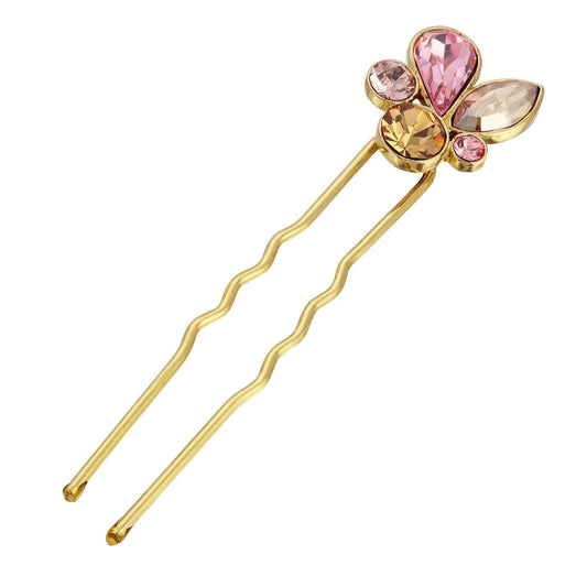 Gold hairpin with pink and clear gemstones on a white background