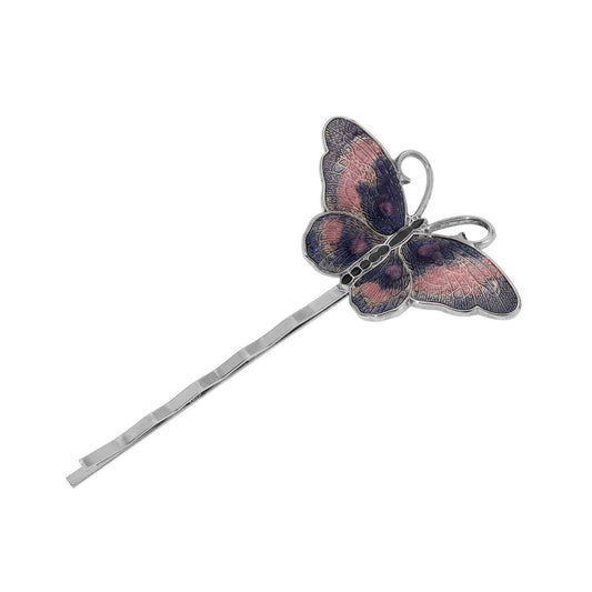 Butterfly-shaped hairpin on a white background