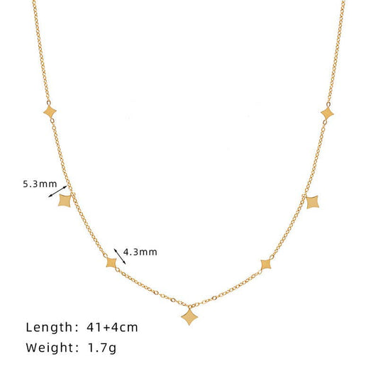 Gold necklace with star-shaped pendants on a white background