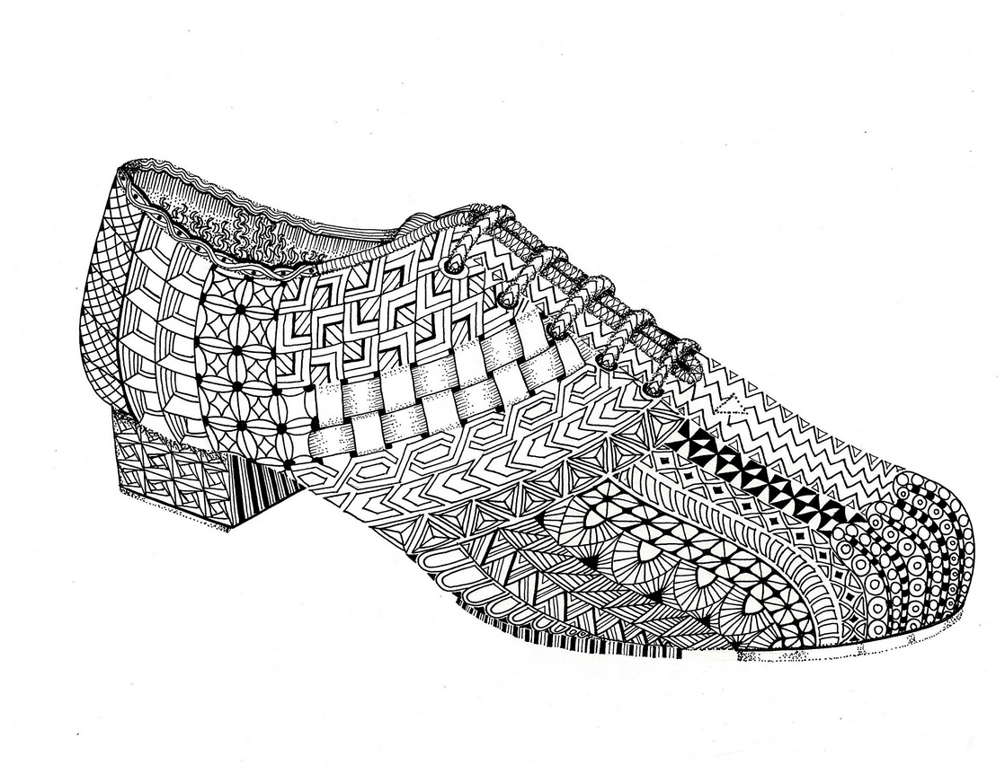 Black and white Renaissance shoe with intricate patterns on a white background