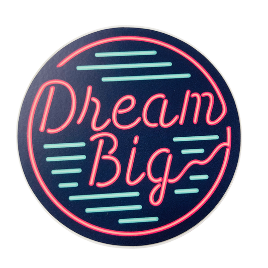 Neon-style 'Dream Big' sticker on a black background