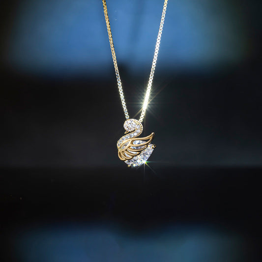 Sparkly swan pendant made of cubic zirconia hanging on a shiny chain.