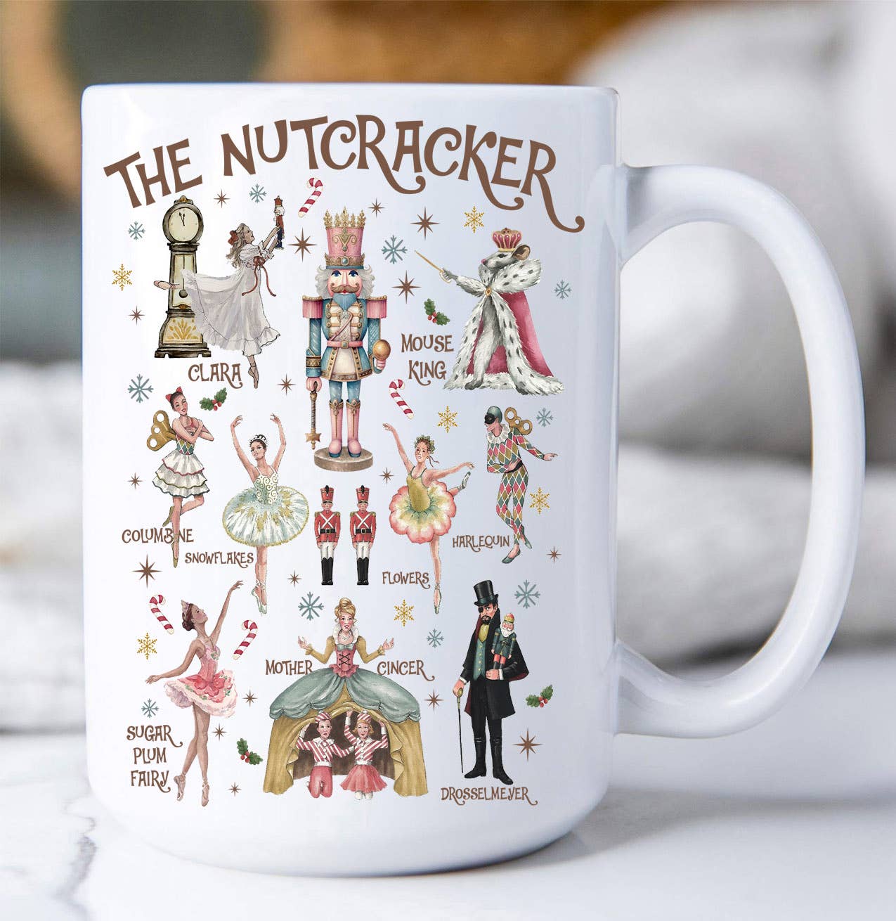White mug with 'The Nutcracker' character illustrations on a white background