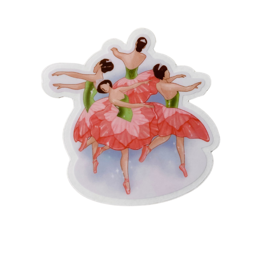 Sticker with three ballerinas in pink and green costumes on a white background